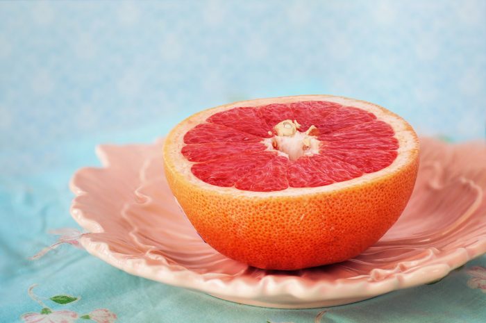 What is the effect of grapefruit on drug action?